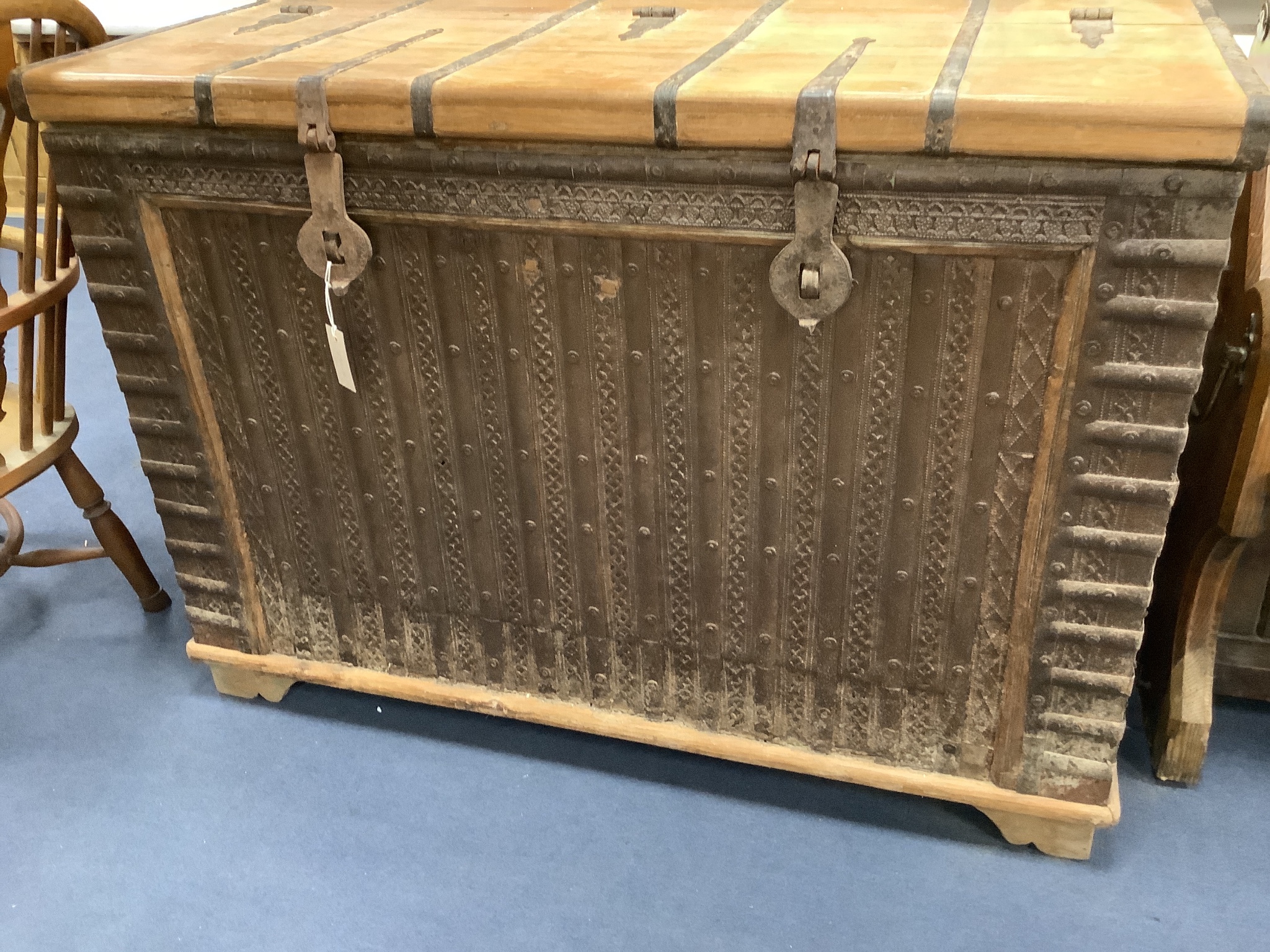 An Indonesian iron bound hardwood trunk, length 122cm, depth 54cm, height 86cm